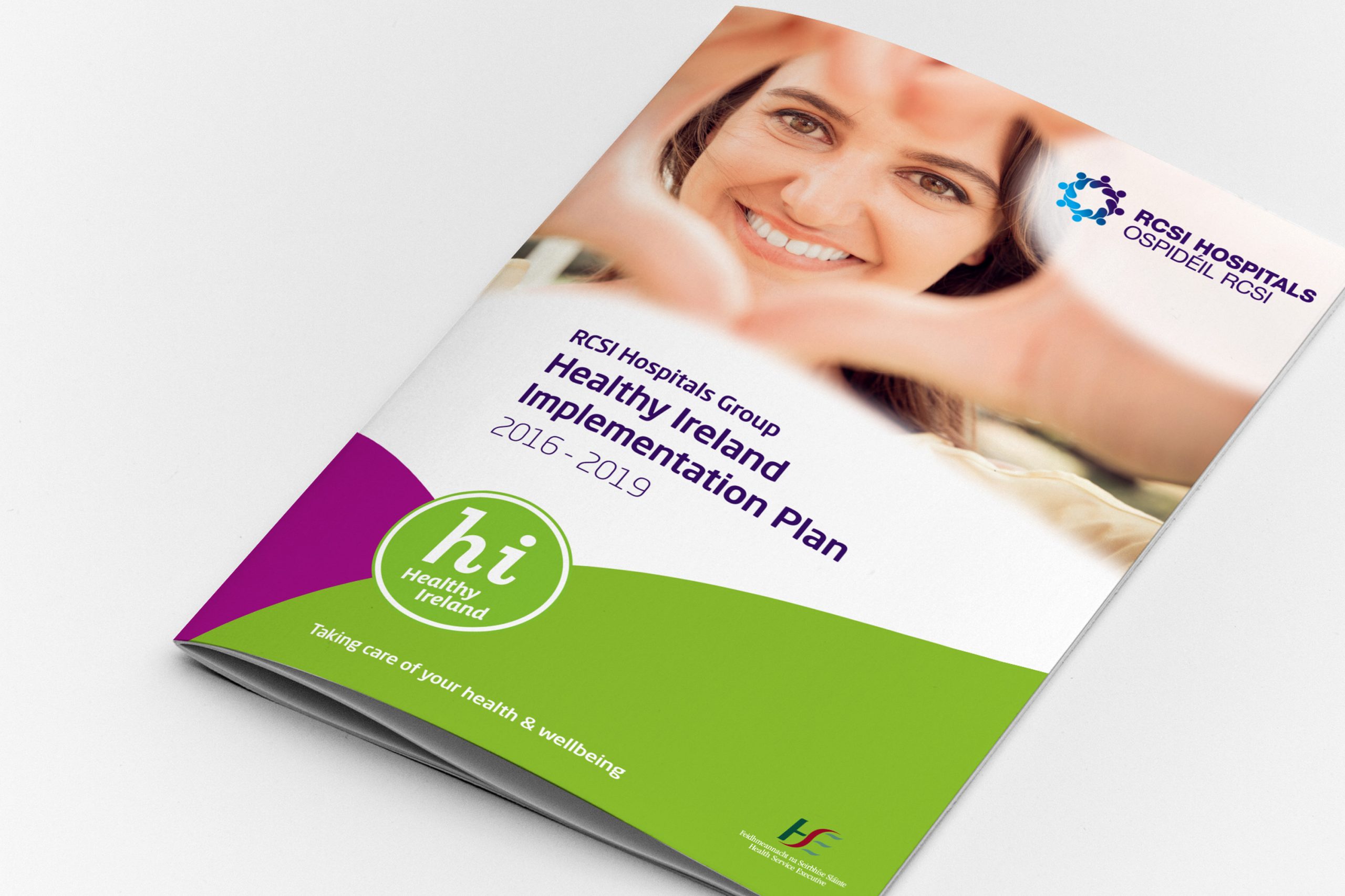report cover showing a women smiling with her hands making a heart symbol
