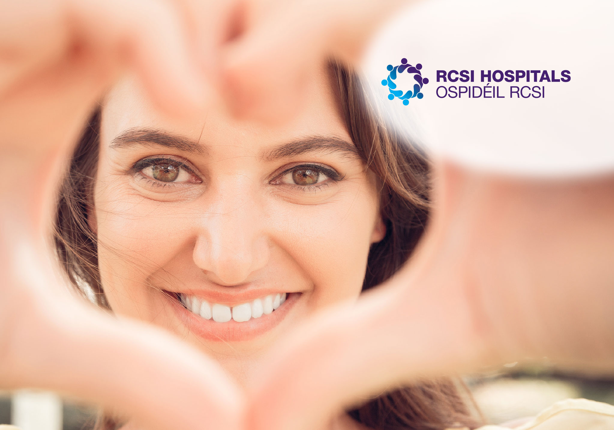 Cover slide with the RCSI Hospitals logo and a women smiling making a heart shape with her hands